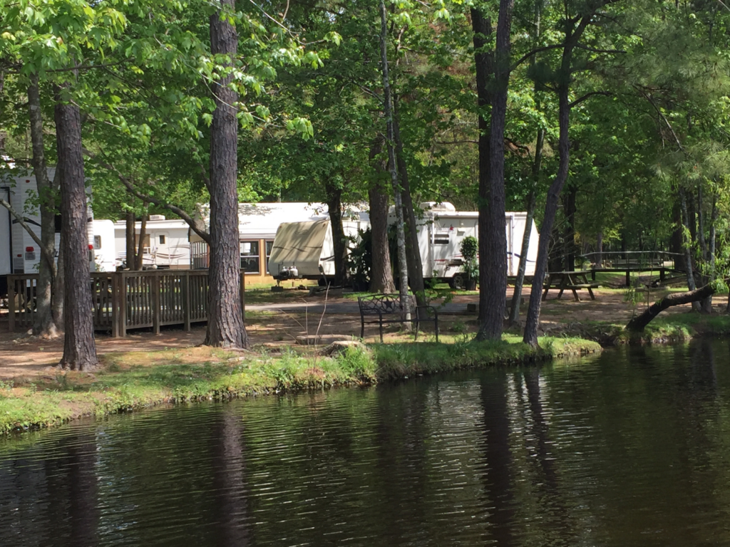 Scenery of RVs and section of lake