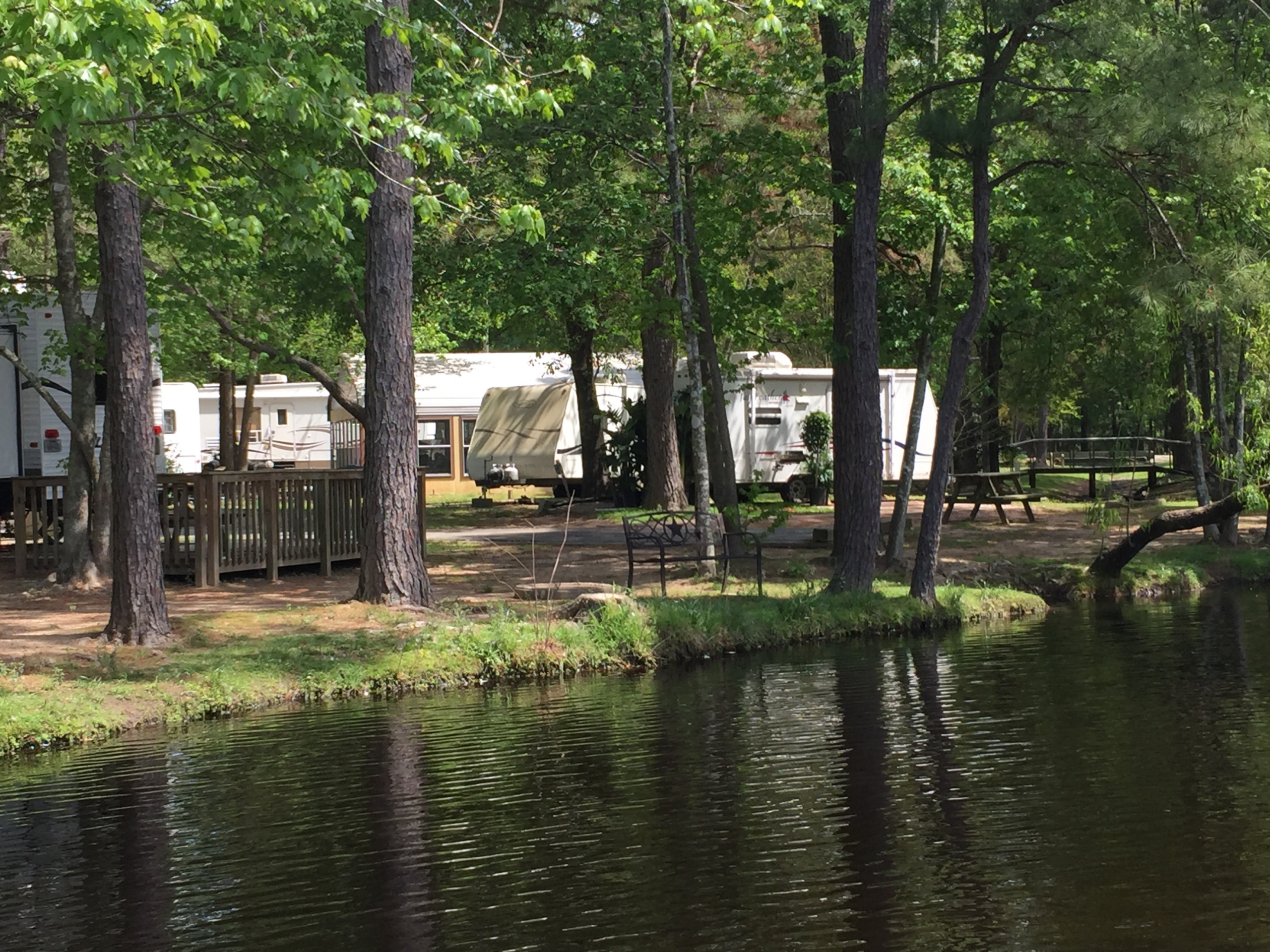 Scenery of RVs and section of lake